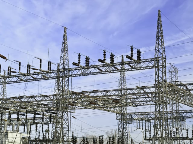 Architecture of electricity Part of electrical substation with steel lattice structures